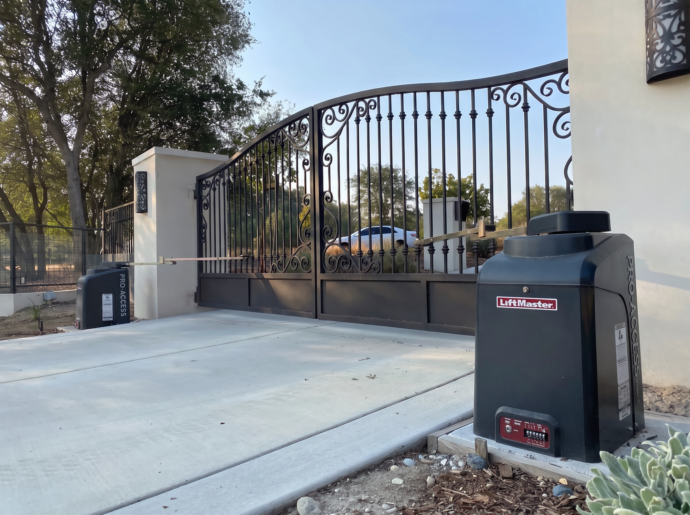 LiftMaster automatic swing gate installation with ornamental iron driveway gates in Southern California